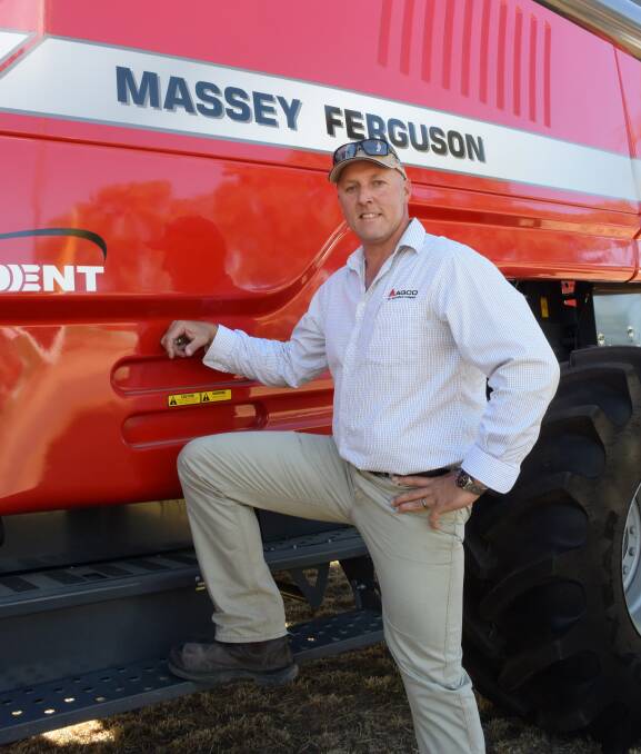 Shane Jardine, harvester product manager with Agco with a Massey Ferguson 9565 harvester at the Wimmera Machinery Field Days.