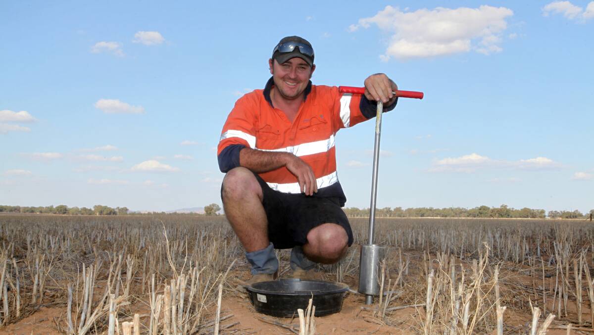 Hassad Australia agronomist Scott Ceeney getting a soil core sample ready for testing. 