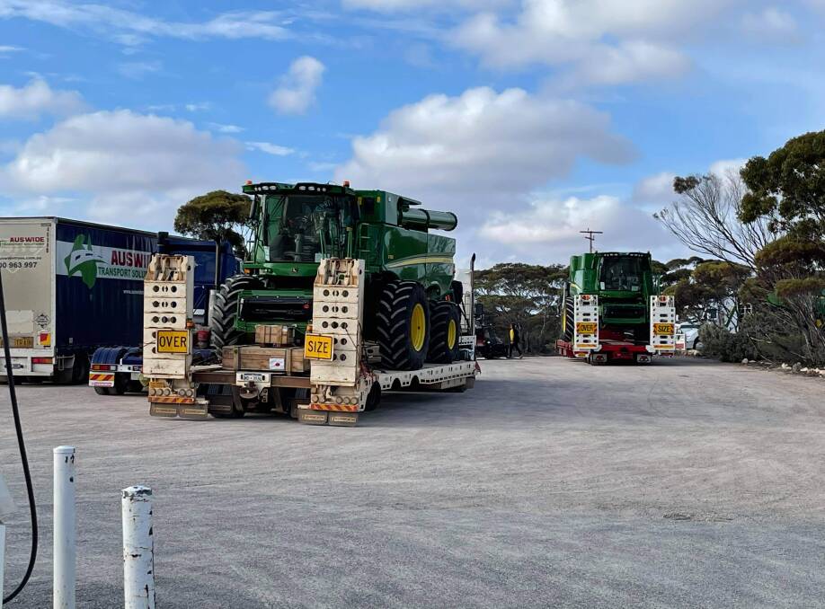 The truck park at Eucla roadhouse, 11 kilometres into WA, with combine harvesters being brought back to machinery dealers after ships carrying them were prevented from unloading at Fremantle due to an industrial dispute and were diverted to Melbourne and Adelaide ports. Photo by: Jarron Ellison.