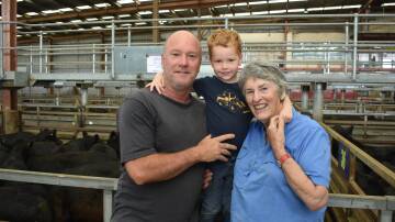 Michael, Hudson (four) and Delma Harrington Hawes, Nayook, came to Pakenham to see how prices were going.