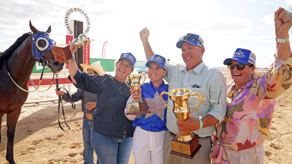 Winners are grinners: Birdsville Cup winner Echo Point with Toni Austin representing her husband, trainer Todd Austin, jockey Brook Richardson, and part owners Will and Marcelle Chandler, Barcaldine. Picture: Max Agency