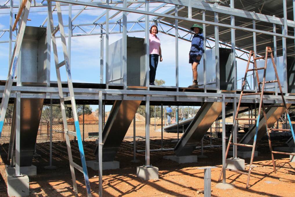 Pauline Brunckhorst and builder Dave Waldron on the highest of the three levels that the new Sunbury shed is being built on.