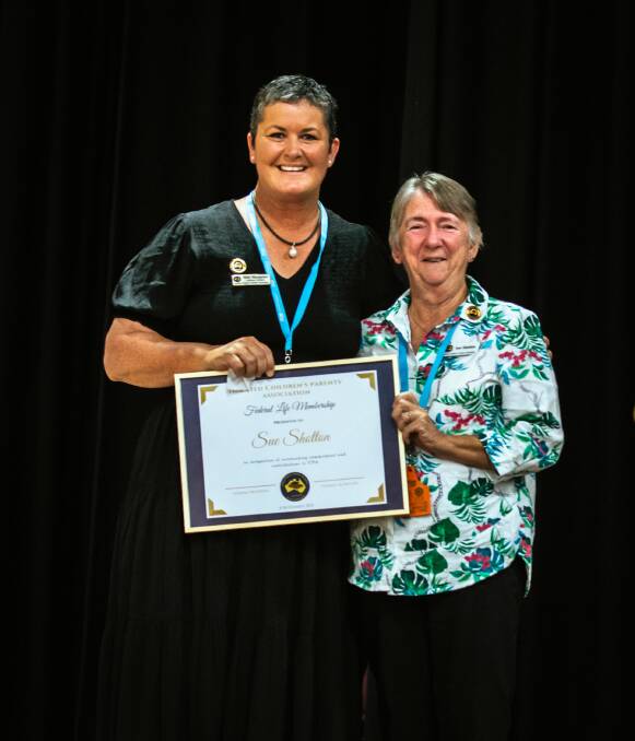 Federal councillor Nikki McQueen presents Sue Shotton with her federal ICPA life membership certificate. Picture: SweetSpot Photography