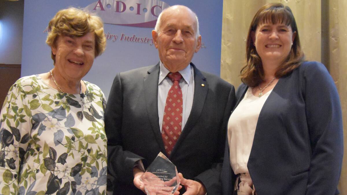 AWARD WINNER: ADIC outstanding service award winner David Partridge (centre) with his wife Elizabeth and outgoing ADC director Simone Jolliffe at the ADIC breakfast on Thursday.