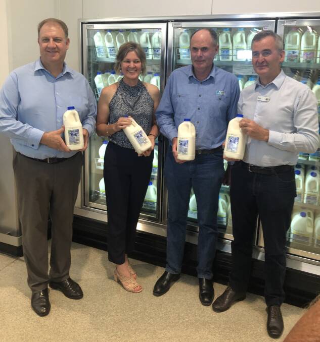 MOVEMENT: David Inall, dairy farmer Erika Chesworth, NSW Farmers, and Graham Forbes, Dairy Connect, and Woolworths managing director, Brad Branducci.