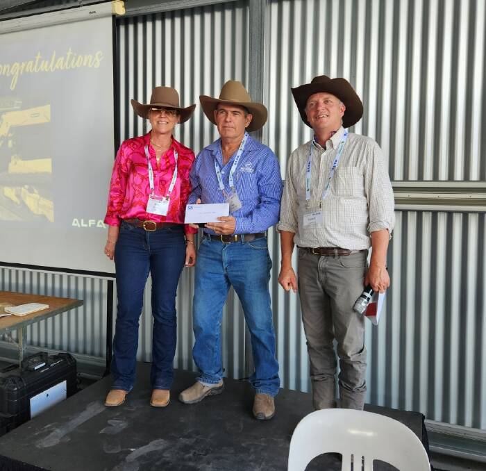 The Innovation Competition award was accepted by Jim Hagan on behalf of innovators Sandra Hagan and Dale Graham from Smithfield Cattle Company. Jim is pictured with ALFA president Barb Madden and Robert Lawrence from Integrated Animal Production (award sponsor). Photo by Kate Stark
