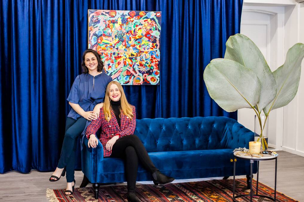 Eloise Harris and Belle Armstrong from Texas Jane, a women's clothing boutique in Wagga Wagga, have grown their presence online to adapt to the changes due to COVID-19. Photo: Sophie O'Brien