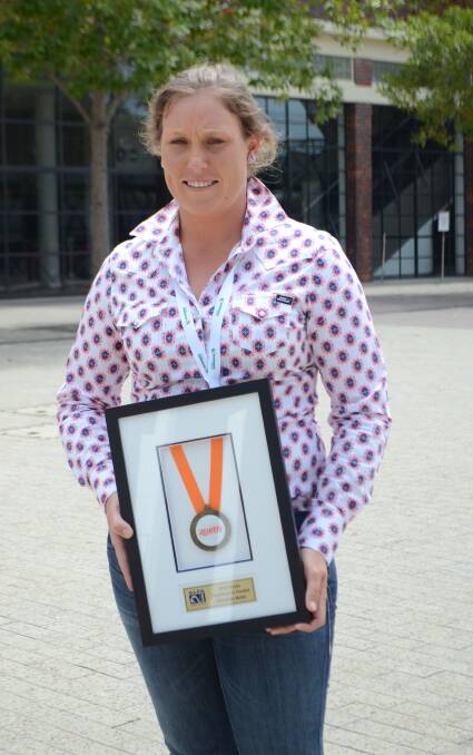Recipient of the Excellence in Feedlot Education Medal, Jane Reid, from Teys Jindalee.