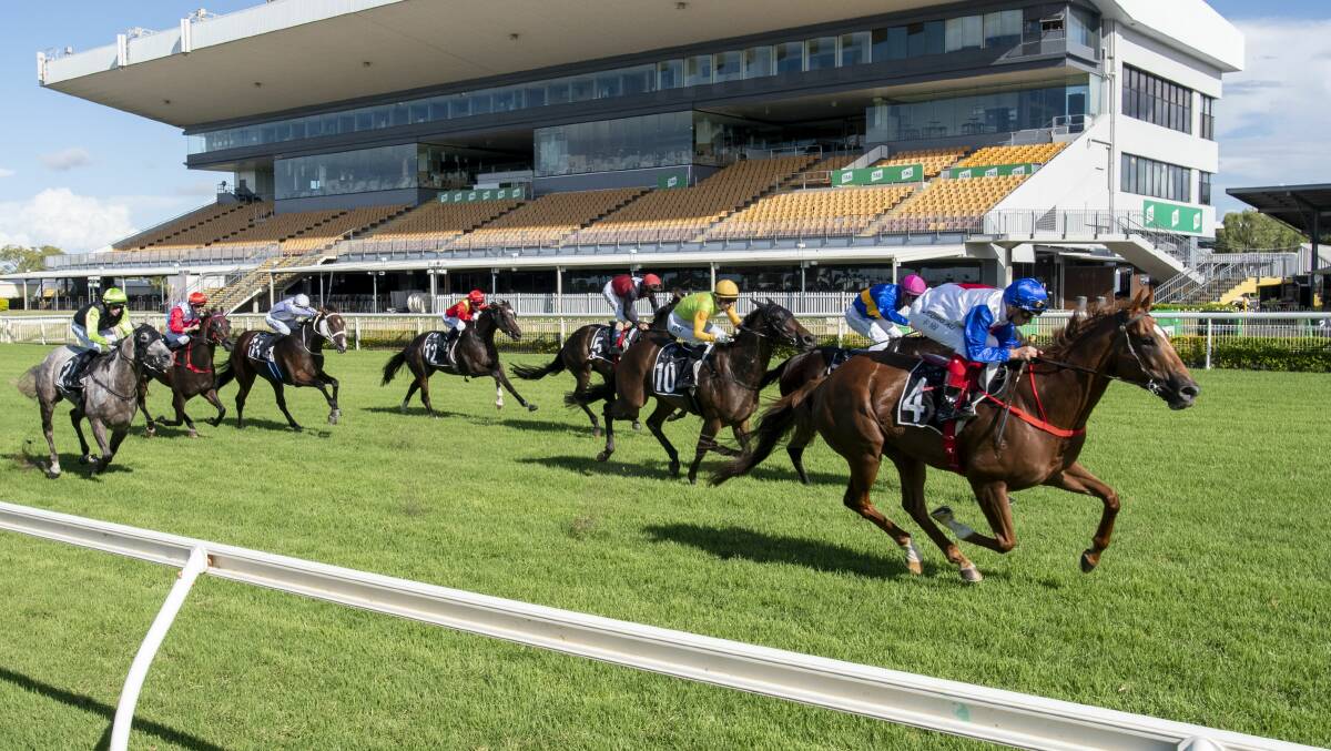 Recent racing at Doomben. Racing Queensland has consolidated Metro North (which includes Doomben) and Metro South West regions into one Metro region. Picture: Racing Queensland
