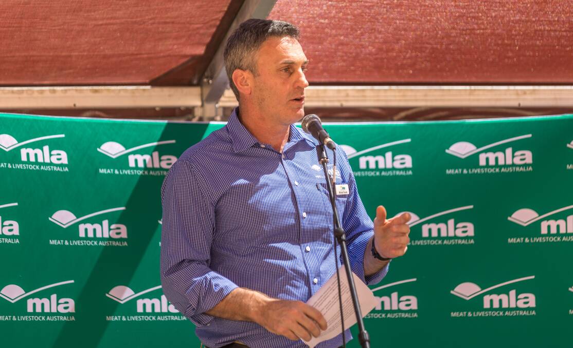 MLA General Manager for International Markets Michael Finucan addresses producers at MLA’s Red Meat 2017 event on Undoolya Station, Alice Springs, last year.