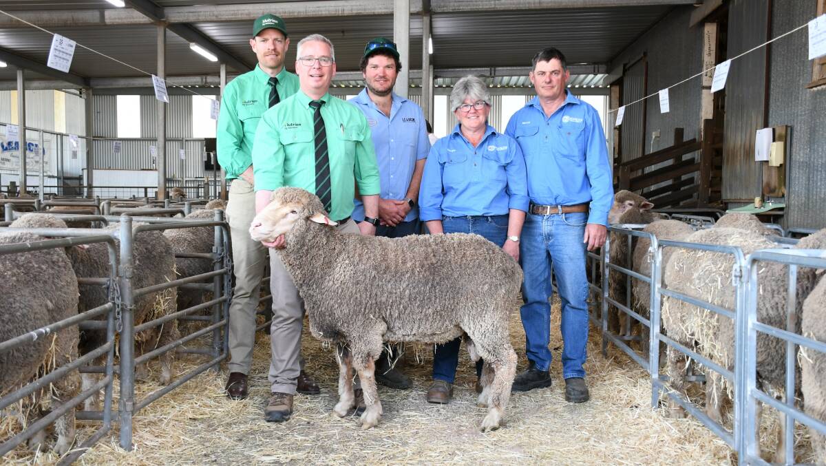 Nutrien Jamestown's Tom Allen, Nutrien stud stock's Gordon Wood, and Leahcim's Alistair Michael congratulate Trudy and Bruce Pengilly, Penrose Poll Merinos, Lort River, WA, on their $8000 purchase. Picture by Quinton McCallum