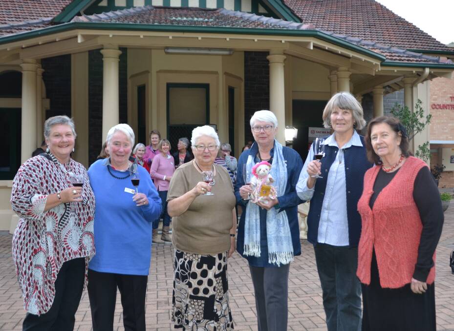CHEERS: SACWA treasurer Sharyn Muller, Josie Kenneally, deputy president Lyn Brew, president Roslyn Schumann, Jennifer Dowling and Rosalie Smith with 90th year mascot Mary the bear, named after founder Mary Warnes. 