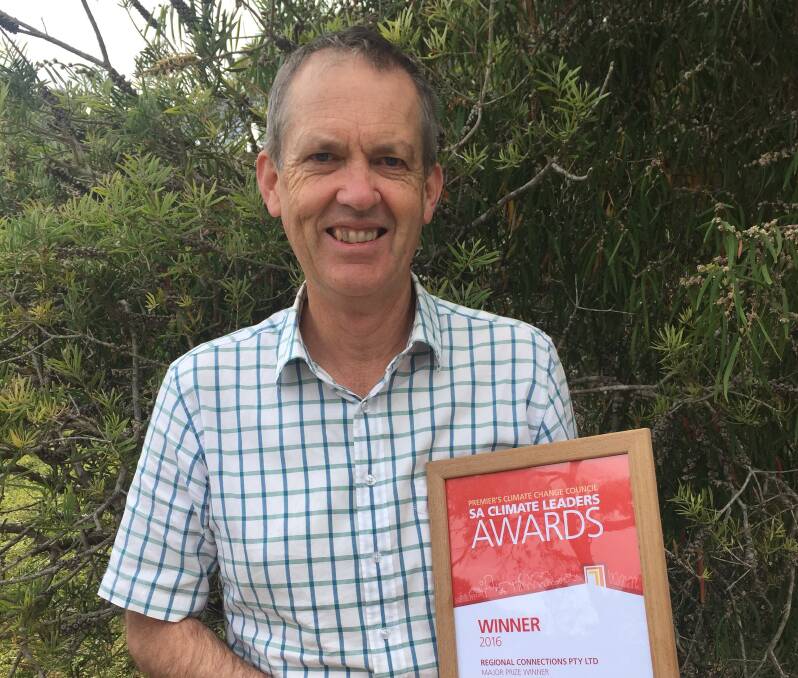 TOP HONOUR: Regional Connections owner Mark Stanley with his Premier's Climate Change Council SA Climate Leader Award, which was presented at the end of last year at the Art Gallery of SA.