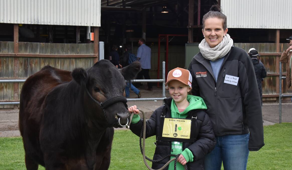 FAMILY TRADITION: Warrawindi Slowpoke with eight-year-old Sophie and her mum Kimberley Wilson, Penola, at the SA Junior Heifer Expo. 