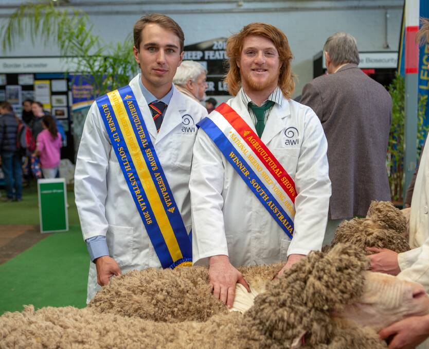 STRONG APPROACH: Runner-up Klay Smith, Cowell, and winner Adam Bennett, Everton, Vic, in the Merino sheep judging.