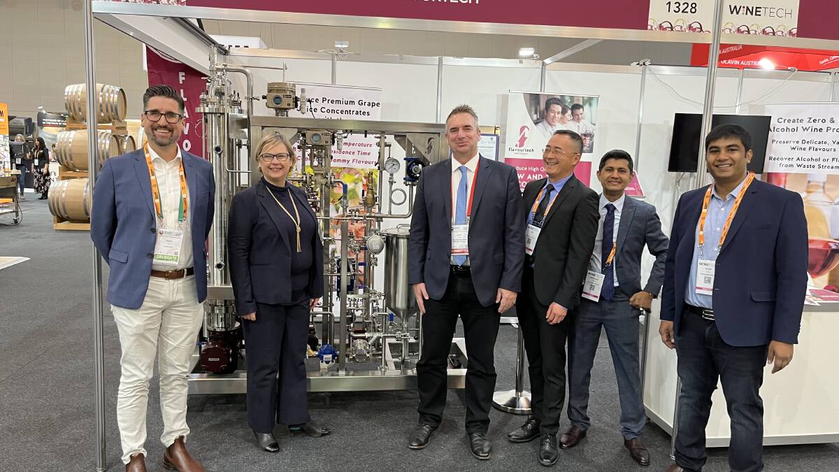 Primary Industries Minister Clare Scriven (second from left) with representatives of the Flavourtech stand at the Wine Industry Tech Conference. Flavourtech received state government funding for its No and Low Alcohol equipment.