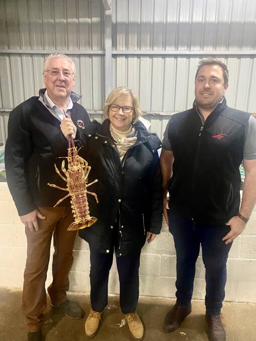 Primary Industries and Regional Development Minister Clare Scriven (centre) with Andrew Fergusson, Fergusson Australia, and Five Star Seafoods factory manager Tom Ryan in Port MacDonnell. 