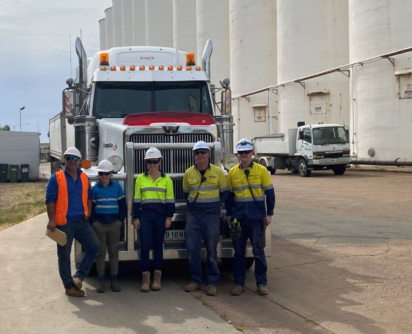 Ben Bussenschutt, Mambray Creek, making the first delivery for the 2022-23 harvest with his son Fletch and Viterra employees Holly Gwynne, Troy Kiriacou and Tom Eberhard at Port Pirie.