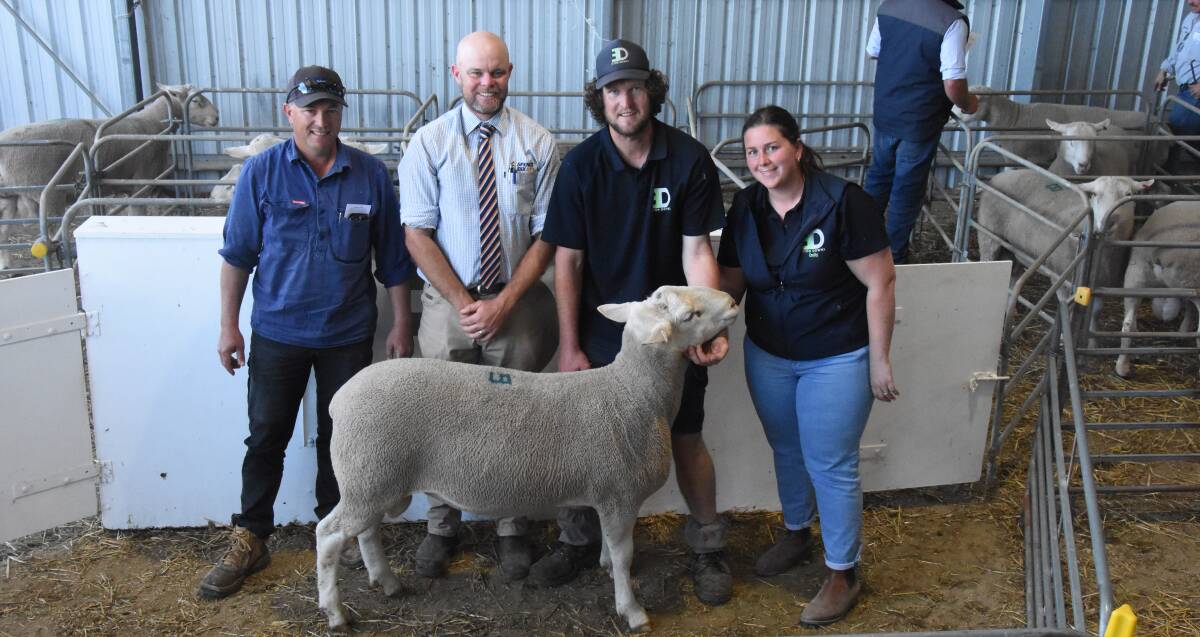 Damon Groth, buyer, Wirrega, Luke Schreiber, Spence Dix & Co, Chris and Emily Rudiger, Elton Downs, with the top price ram. Pictures by Liam Wormald 