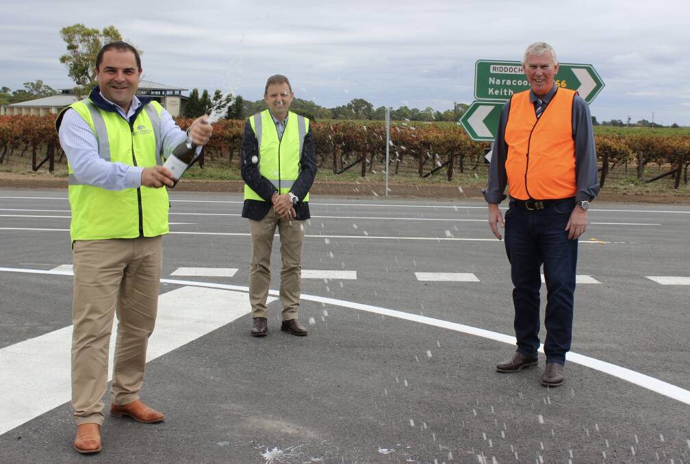 Barker MP Tony Pasin, McKillop MP Nick McBride and Wattle Range Council mayor Des Knoll celebrate the opening of the bypass.