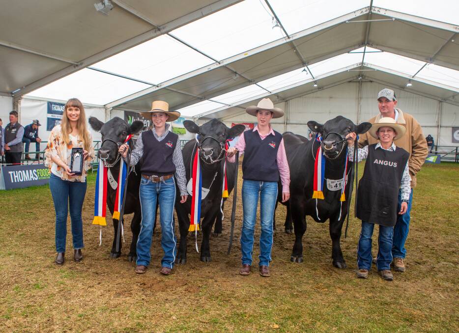 Hills Farm Supplies' Claire Pearce presents the interbreed sires progeny trophy to Emily, Maddi, Natalie and Stuart Hann, Nampara stud, Kingston SE. Their progeny were by Varilek Geddes 7078. Picture by Jacqui Bateman 