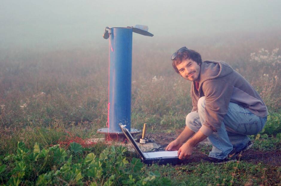 IN PRACTICE: Gabriel Rau downloads water data from a bore. Photo: IAN ACWORTH