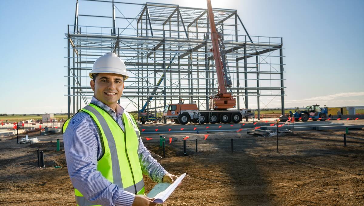 MAKING PROGRESS: TFIs group engineering manager Nekta Nicolaou in front of the construction under way at the Murray Bridge site. 