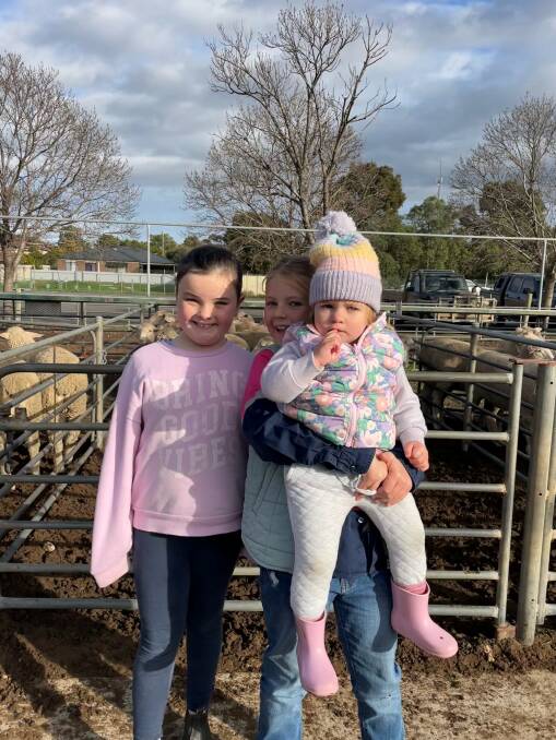 Charlie Cattanach, Isabella Singleton and holding Emmi McKay were checking out the sale. Picture supplied