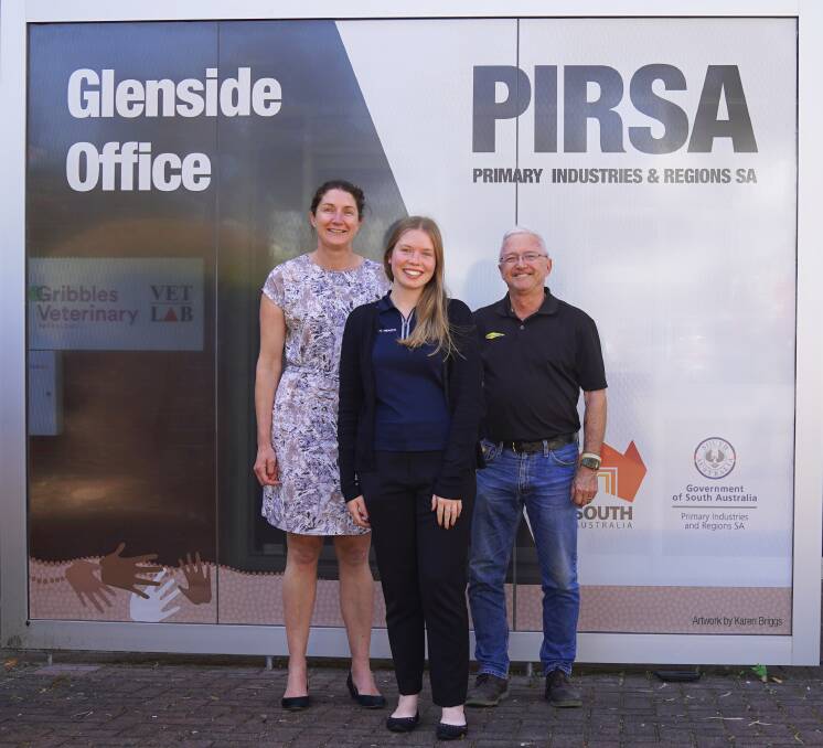 NEW FOCUS: New pig industry biosecurity officer Chelsea Dossett (centre) with PIRSA Chief Veterinary Officer Mary Carr and SA pig veterinarian Barry Lloyd at the PIRSA Glenside office. 