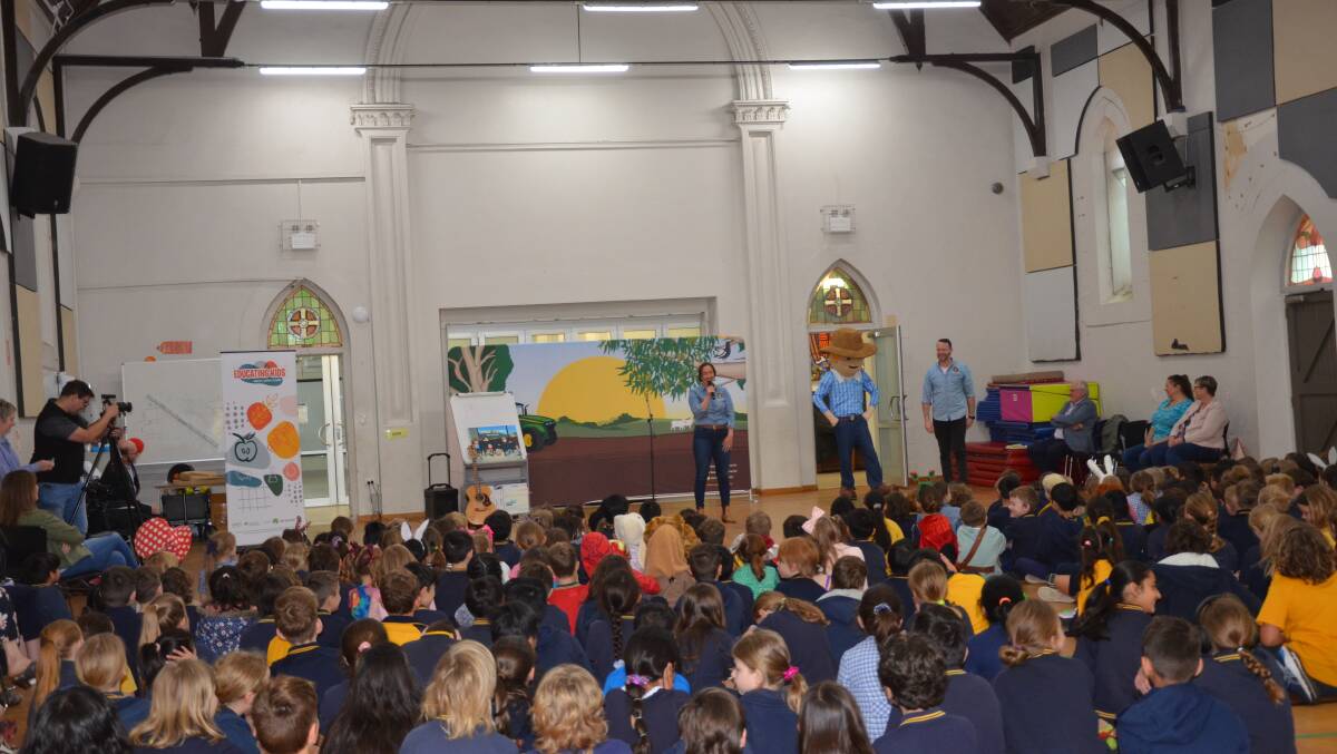 Students at Goodwood Primary School learning from George the Farmer.
