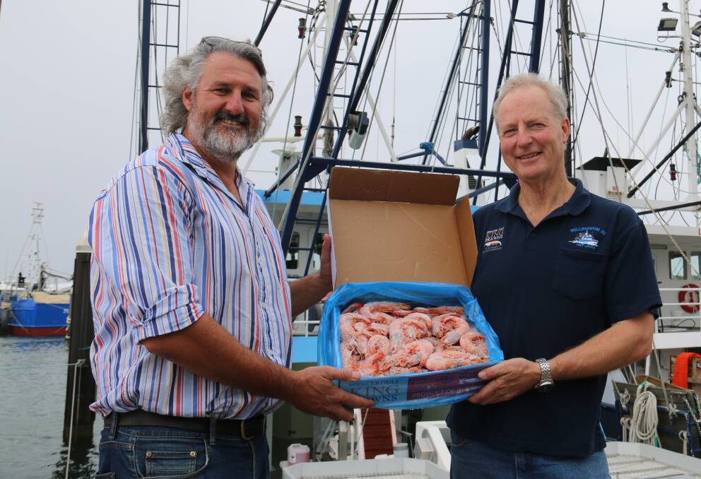 WHAT A CATCH: Spencer Gulf and West Coast Prawn Fishermen’s Association executive officer Simon Clark with prawn fisher Greg Palmer. 