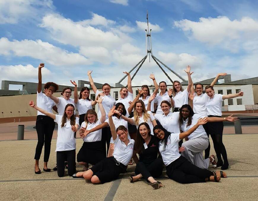 BIG TRIP: The 2018 Power Trip winners with Country to Canberra CEO Hannah Wandel in front of Parliament House.