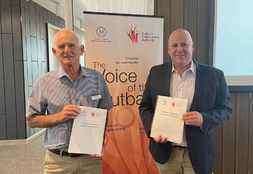 POTENTIAL EXPLORED: Outback Communities Authority chair Bill McIntosh and Primary Industries and Regional Development Minister David Basham with the SA Pastoral Rangelands carbon potential report.