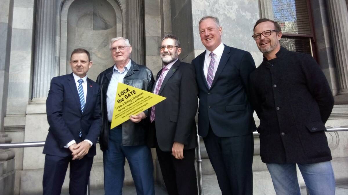 PROGRESS MADE: MacKillop MP Nick McBride, Coonawarra vigneron Dennis Vice, Greens MLC Mark Parnell, Mount Gambier MP Troy Bell and LCPA chairperson Angus Ralston, Penola, on the steps of Parliament House.