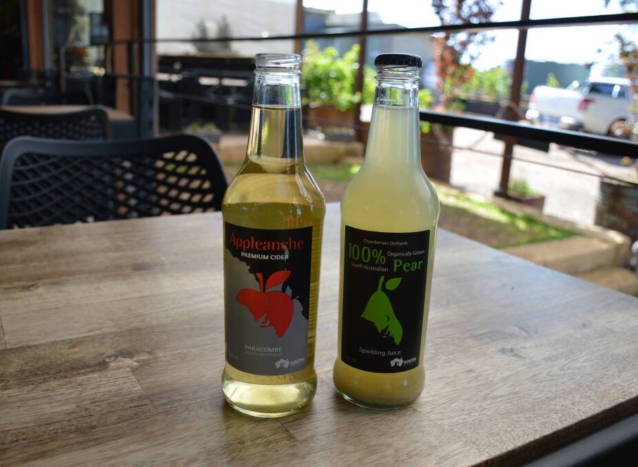 The McArdles make a range of pear and apple products, both alcoholic and non-alcoholic, available from their shed door. Picture by Elizabeth Anderson