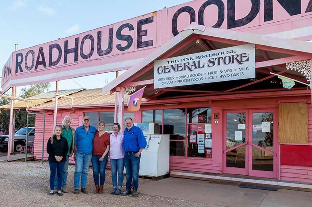 EXCITED: Former owners Neville and Adrianna Jacob, welcome the new Pink Roadhouse owners Ian and Cathie King, and Jennifer and Peter Moore.