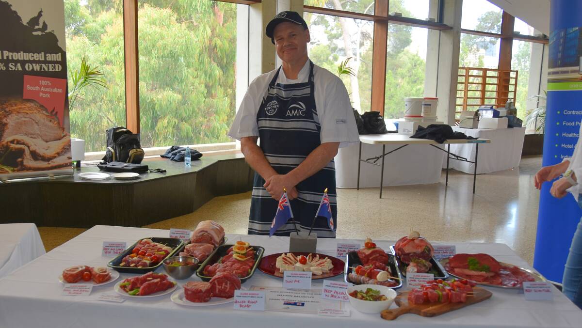 Apprentice of the year winner Glen Murphy, NSW, with the meat dishes he produced. Picture by Elizabeth Anderson