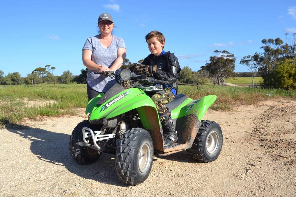 QUAD SAFETY: Karen Baines has taught son Ben some safety measures when riding. 