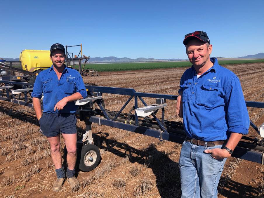 HAPPY CHAPPIES: David Brownhill (right) and sprayer operator Lochie Murray are delighted with the performance of their WEED-IT Quadro trailing sprayer in a large-scale cropping operation on the NSW Liverpool Plains. 