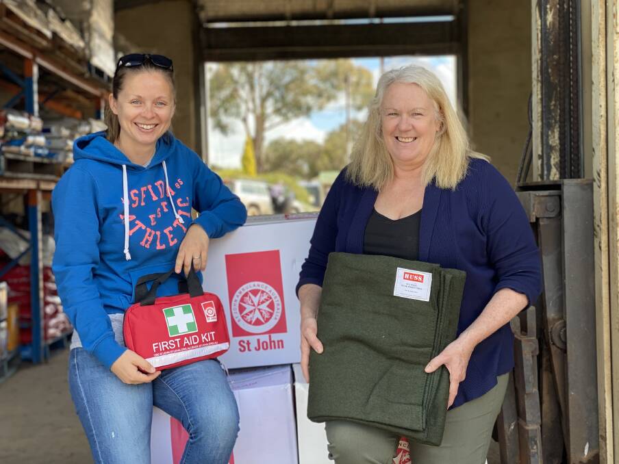 Community-minded: Fundraising local Sabrina Davis, along with Parndana's Cheryl May, have combined to deliver 150 St Johns first aid kits and 150 woollen blankets to farm firefighters across the Island. Photo: supplied.