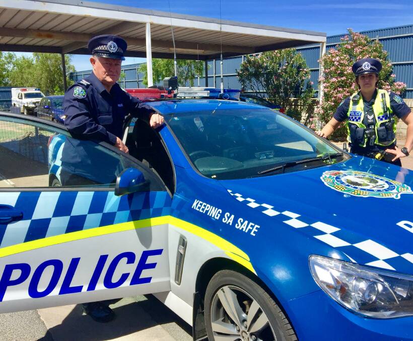 DRIVE.ARRIVE: Sergeant Steve Griggs, left, with Senior Constable Krista Young, spoke to The Recorder about road safety as part of the drive.arrive. campaign.