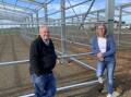 SITE APPROVED: KI Wool secretary Greg Johnsson and chair Christine Berry at the new shed site in late July. 