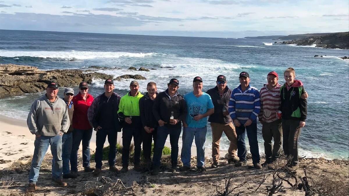 PINK SHIRTS: Visiting Elders livestock agents from Lameroo, Minlaton, Kadina, Roseworthy and Clare enjoying the stunning south coast after helping their fellow agent Greg Downing. 
