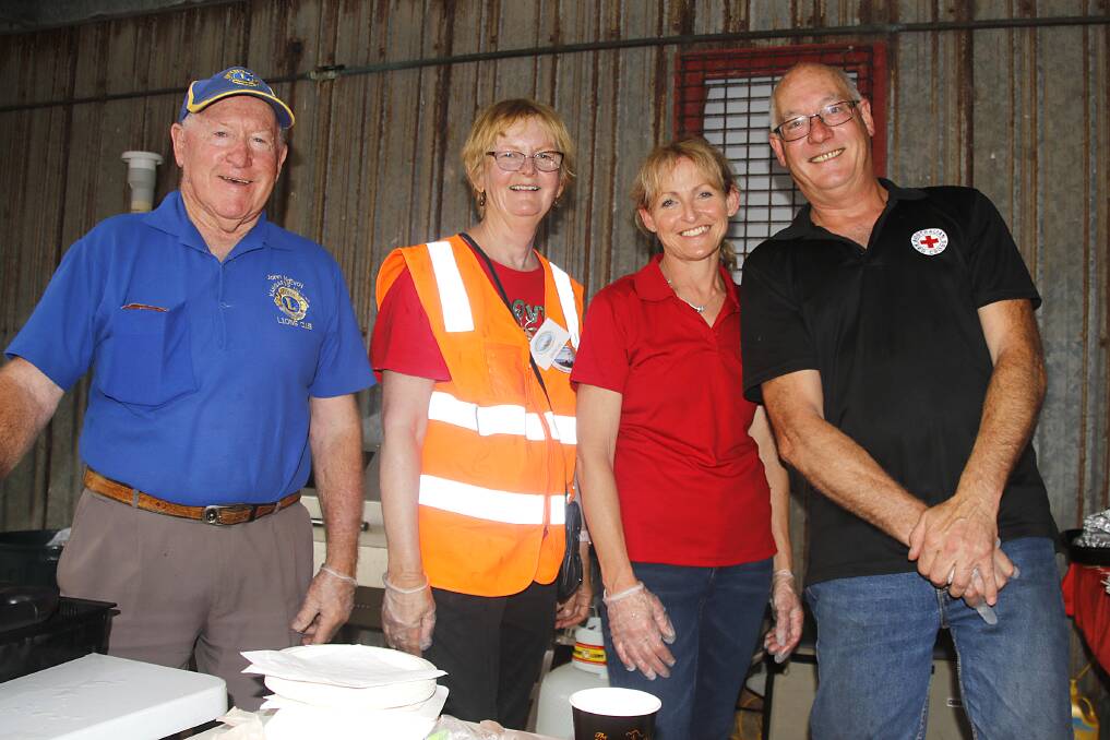 At the Red Cross kebab stall are John McEvoy, Beth Davis, Julie Walter and Jo Tippett at the 2021 Kingcote Christmas pageant on Kangaroo Island. Photo: Maggie's Photography 