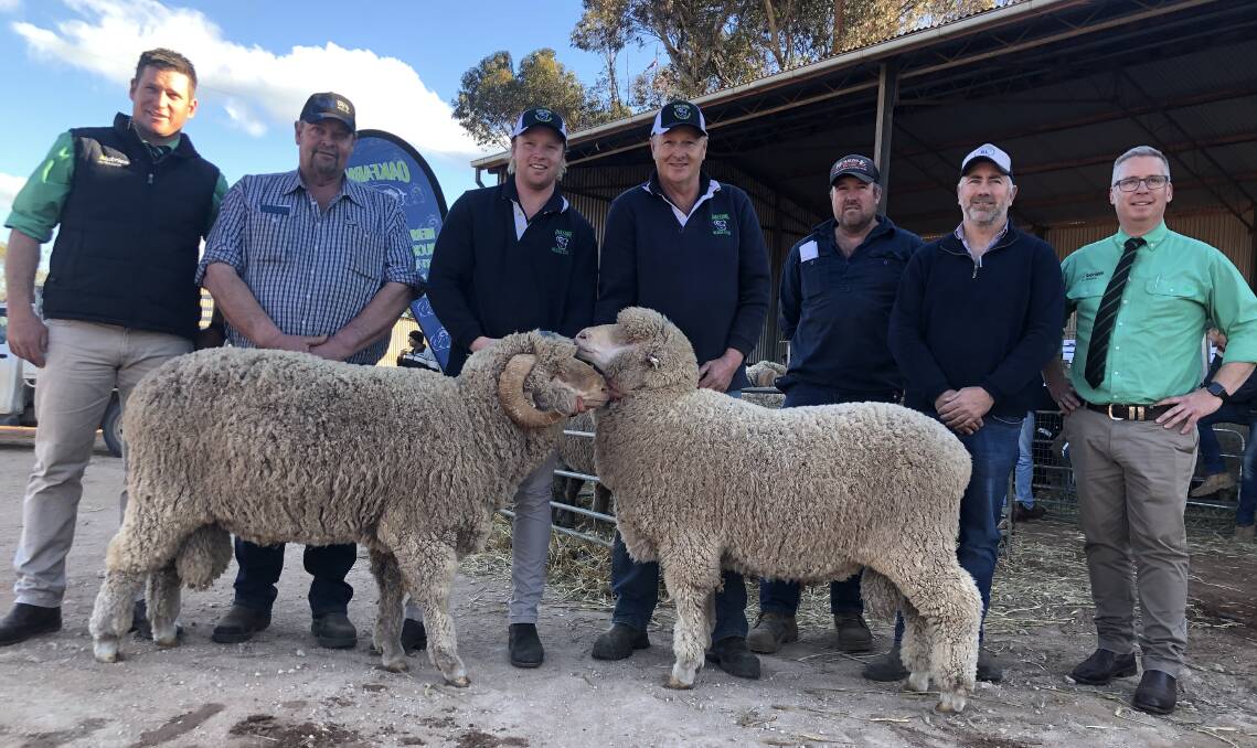 With the top price Merino and Poll Merino are Nutrien Kimba branch manager Simon Arcus, Sharlu Park stud's Andrew Saegenschnitter, Harrison Lienert, Oak Farms owner Nick Lienert, David Hickman, Castle Hill, Port Vincent, Anthony Bray, Bray Livestock/Elders Minlaton and Nutrien Livestock stud stock manager Gordon Wood.