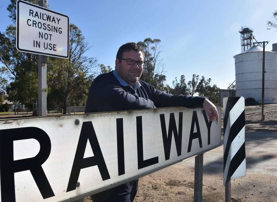 SAFETY: Tim Blacker at the rail crossing near the Viterra silos which was a factor in the council refusing the application for the 42-metre road trains on Railway Terrace.