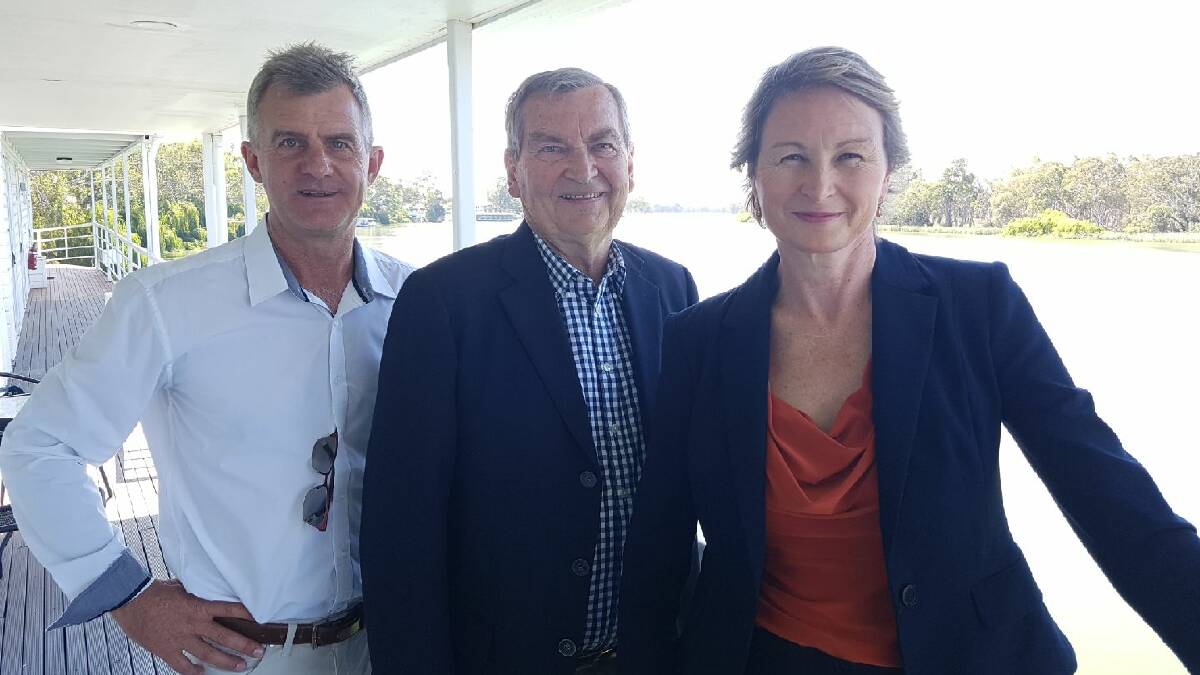 AWARDED: Renmark Irrigation Trust presiding member Peter Duggin, Murray-Darling Basin Authority chairperson Neil Andrew and Commonwealth Environmental Water Holder CEO Jody Swirepik on the River Murray.