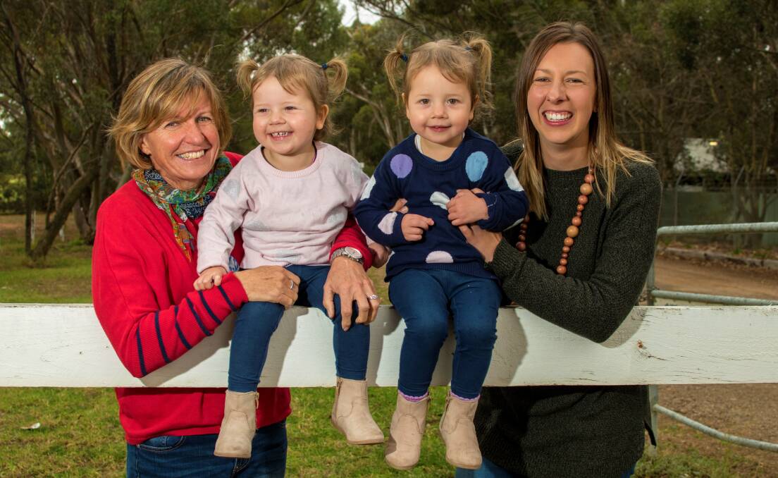 HELPING HANDS: Heather Needs, with grandchildren Lana and Marnie and daughter-in-law Emma Needs.