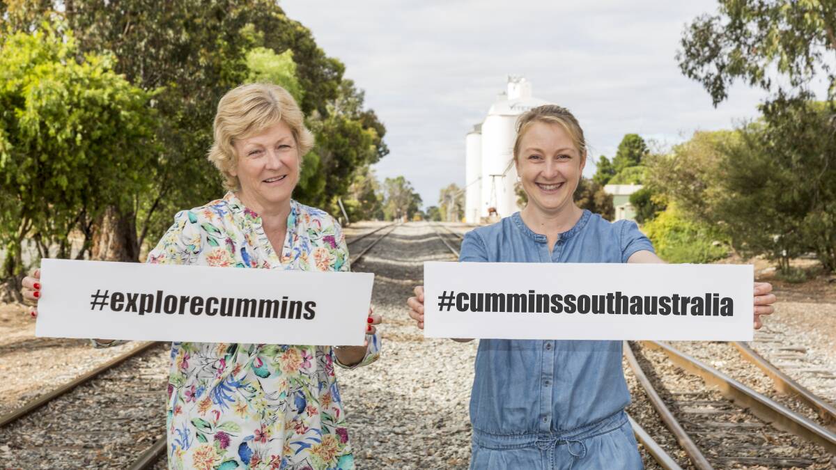 CUMMINS PROUD: Wendy Holman and Anika Swaffer show that Cummins will take all avenues to promote the town.