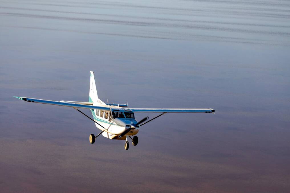 FLYING HIGH: Wrightsair is being kept busy flying tour flights over the Lake and Outback.